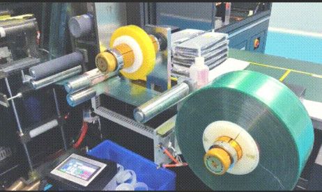 Film lamination equipment at the first station